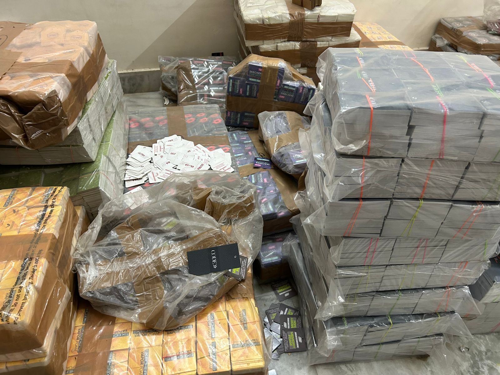 Finished labels and packaging banded, shrink-wrapped and staged for dispatch